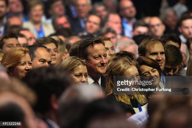 Prime Minister Cameron listens to London mayor Boris Johnson addresses delegates during the Conservative Party Conference on October 6, 2015 in...