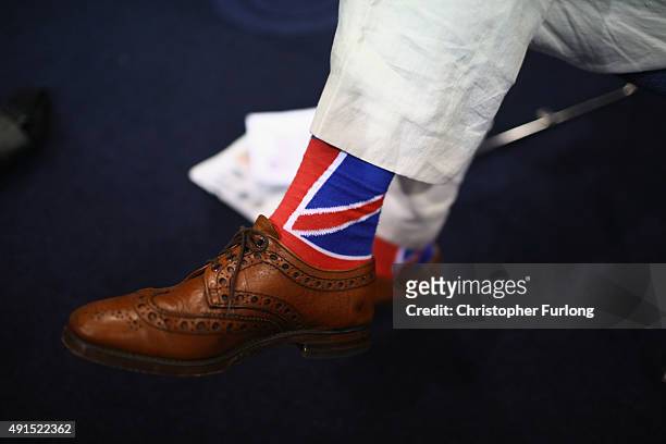Delegate wears Union flag socks during the Conservative party conference on October 6, 2015 in Manchester, England. Home Secretary Theresa May...