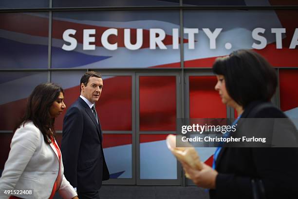 Chancellor George Osborne walks into Manchester Central during the Conservative party conference on October 6, 2015 in Manchester, England. Home...