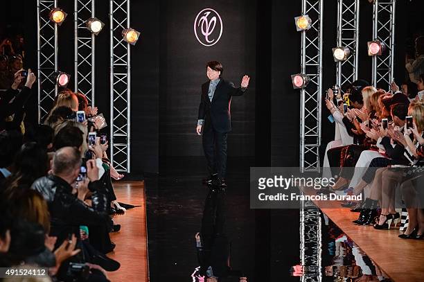 Designer Valentin Yudashkin walks the runway after the Valentin Yudashkin show as part of the Paris Fashion Week Womenswear Spring/Summer 2016 on...
