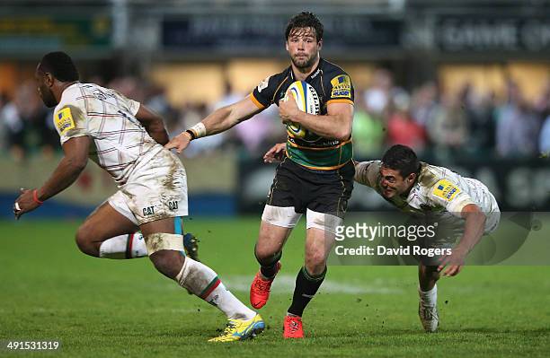 Ben Foden of Northampton breaks with the ball during the Aviva Premiership semi final match between Northampton Saints and Leicester Tigers at...