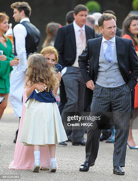 Geri Halliwell, Bluebell Halliwell and Christian Horner attend Poppy Delevingne and James Cook's wedding reception held in Kensington Palace Gardens...