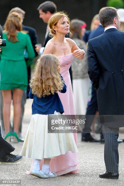 Geri Halliwell and Bluebell Halliwell attend Poppy Delevingne and James Cook's wedding reception held in Kensington Palace Gardens on May 16, 2014 in...