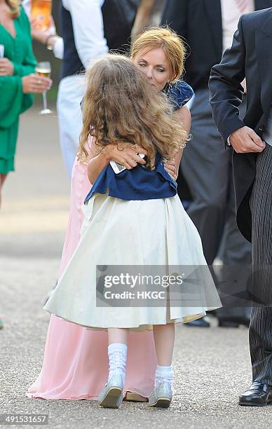 Geri Halliwell and Bluebell Halliwell attend Poppy Delevingne and James Cook's wedding reception held in Kensington Palace Gardens on May 16, 2014 in...