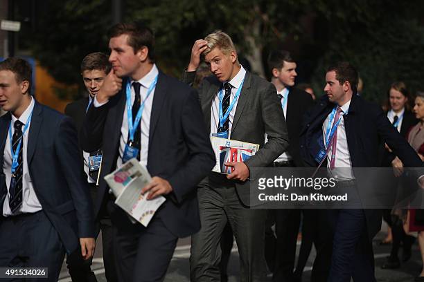 Visitors arrive for the Conservative party conference on October 6, 2015 in Manchester, England. Home Secretary Theresa May is due to address...