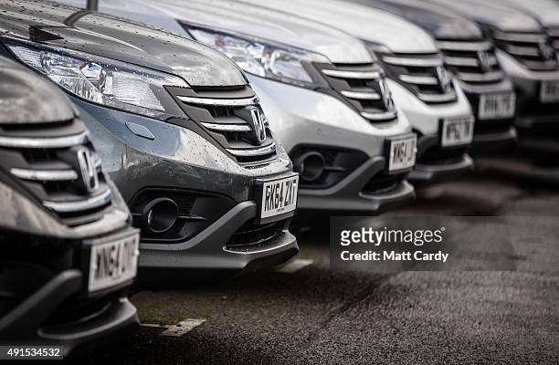 Honda cars are offered for sale on the forecourt of a main motor car dealer in Brislington on October 6, 2015 in Bristol, England. Latest data from...