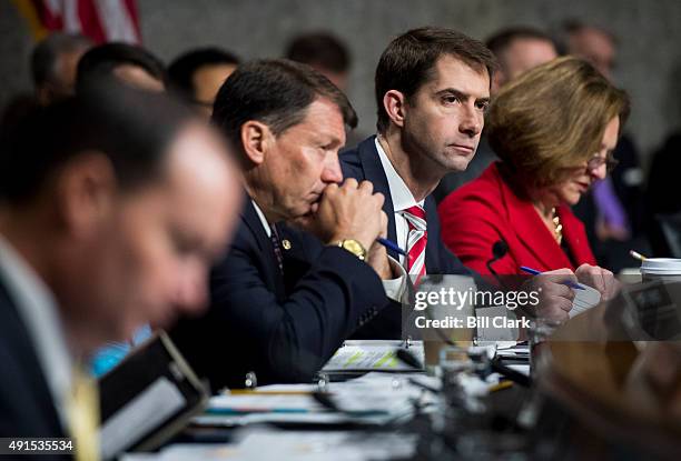 Sen. Tom Cotton, R-Ark., listens as General John F. Campbell, Resolute Support Mission Commander in Afghanistan, testifies during the Senate Armed...