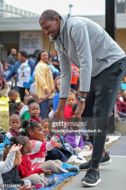 Kevin Durant of the Oklahoma City Thunder hosts a court dedication on October 05, 2015 at North Highland Elementary School in Oklahoma City, Oklahoma...