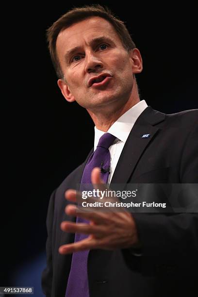 Health Secretary Jeremy Hunt delivers his keynote speech to delegates during the Conservative Party Conference on October 6, 2015 in Manchester,...