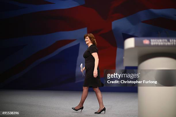 Education Secretary Nicky Morgan leaves the stage after delivering her keynote speech to delegates during the Conservative Party Conference on...