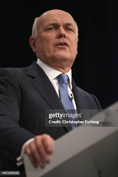 Work and Pensions Secretary Iain Duncan Smith delivers his keynote speech to delegates during the Conservative Party Conference on October 6, 2015 in...