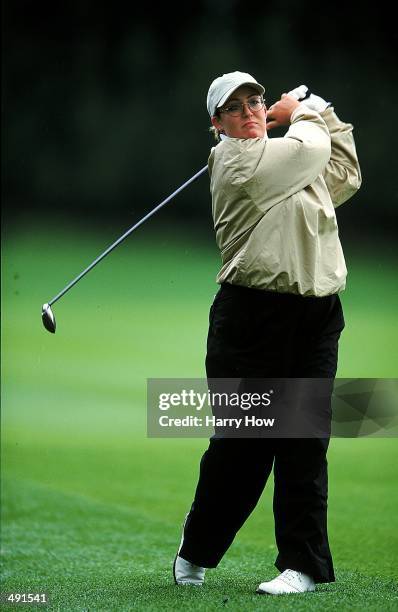 Cristie Kerr watches the ball after hitting it during the Du Maurier Classic at Priddis Greens Golf Course in Priddis, Alberta, Canada. Mandatory...