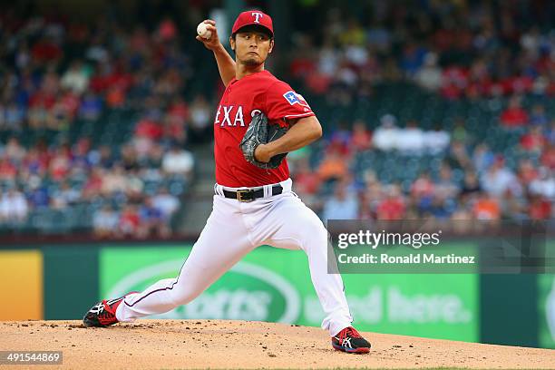 Yu Darvish of the Texas Rangers throws against the Toronto Blue Jays in the first inning at Globe Life Park in Arlington on May 16, 2014 in...