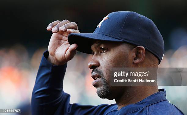 Manager Bo Porter of the Houston Astros waits in the dugout before the start of their game against the Chicago White Sox at Minute Maid Park on May...