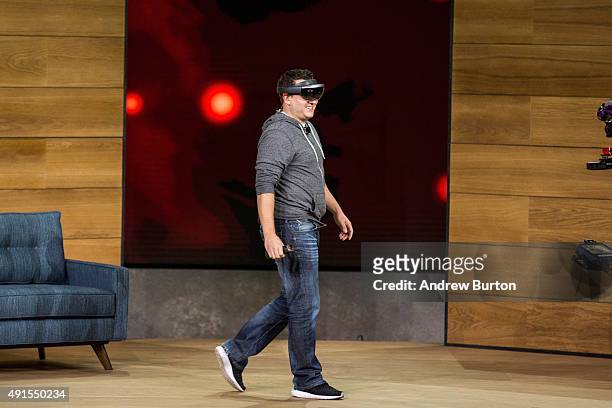 Man demonstrates using the new virtual reality gaming head set titled the Microsoft HoloLens at a media event for new Microsoft products on October...