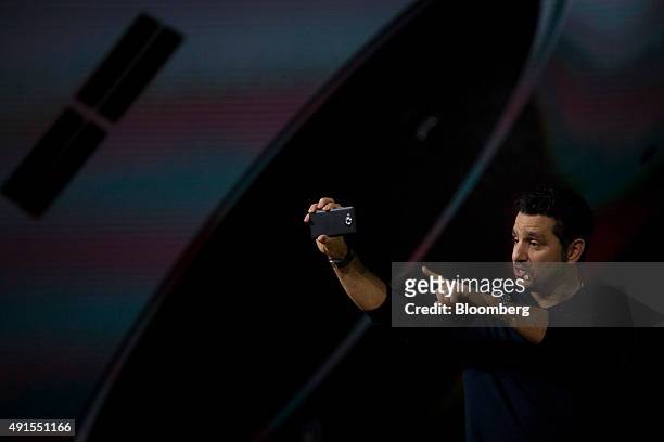 Panos Panay, corporate vice president of Microsoft Corp. Surface, displays the new Microsoft Lumia smartphone during the Windows 10 Devices event in...