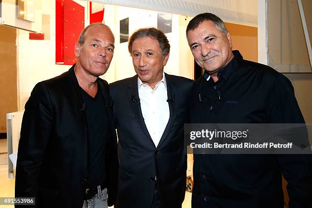 Laurent Baffie, Presenter of the show Michel Drucker and Main Guest of the show, Humorist Jean-Marie Bigard attend the 'Vivement Dimanche' French TV...