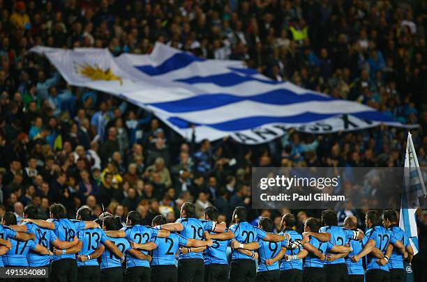 Uruguay players line up in front of their fans prior to the 2015 Rugby World Cup Pool A match between Fiji and Uruguay at Stadium mk on October 6,...