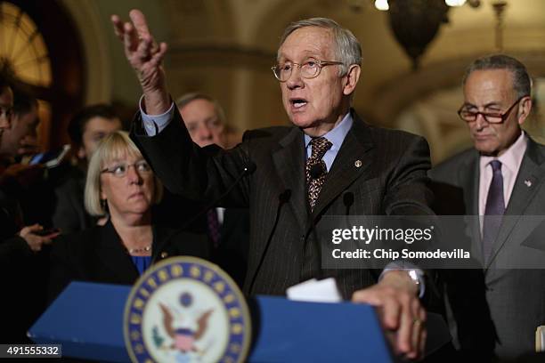 Senate Minority Leader Harry Reid joins fellow Senate Democratic leaders, including Sen. Patty Murray and Sen. Charles Schumer , while talking to...