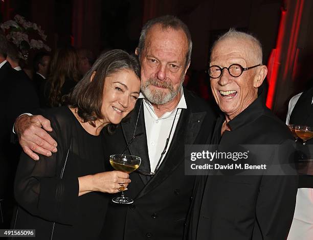 Anwen Rees-Myers, Terry Gilliam and Sir John Hurt attend a cocktail reception at the BFI Luminous Fundraising Gala in partnership with IWC and...