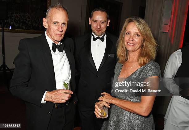 James Fox, Rhidian Davis and Sabrina Guinness attend a cocktail reception at the BFI Luminous Fundraising Gala in partnership with IWC and crystals...