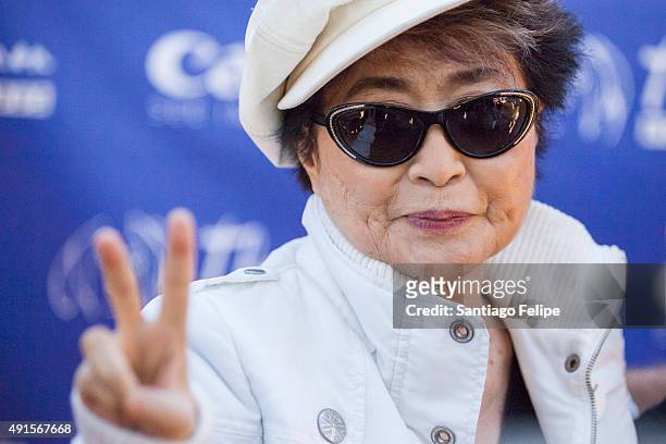 Yoko Ono attends a world record attempt to create the world's largest human peace sign at Central Park on October 6, 2015 in New York City. At...