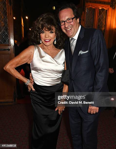 Joan Collins and Percy Gibson attend a cocktail reception at the BFI Luminous Fundraising Gala in partnership with IWC and crystals by Swarovski at...