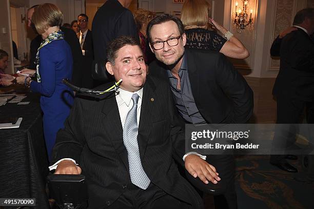 Marc Buoniconti and actor Christian Slater attend the 30th Annual Great Sports Legends Dinner to benefit The Buoniconti Fund to Cure Paralysis at The...