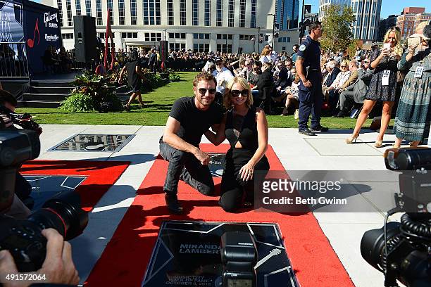 Dierks Bentley poses with Miranda Lambert as she is induced into the Nashville Music City Walk of Fame on October 6, 2015 in Nashville, Tennessee.