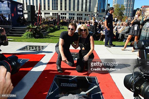 Dierks Bentley poses with Miranda Lambert as she is induced into the Nashville Music City Walk of Fame on October 6, 2015 in Nashville, Tennessee.