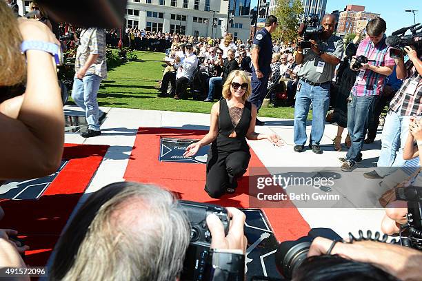 Miranda Lambert poses with her star at Nashville Music City Walk of Fame on October 6, 2015 in Nashville, Tennessee.