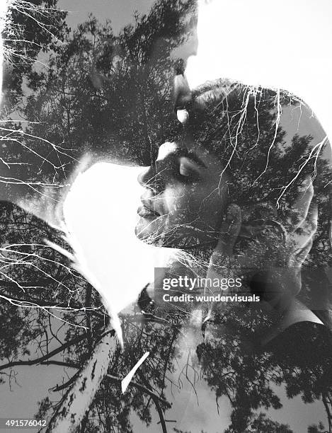 loving couple image with tree branches in photgraphic effect - composite bonding stock pictures, royalty-free photos & images