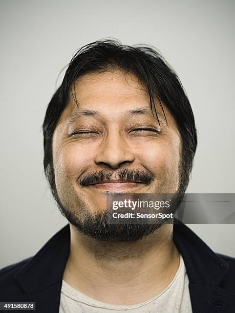 portrait of a happy japanese man looking at camera - face close up bildbanksfoton och bilder