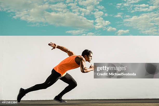 hispanic runner - man sprint stock pictures, royalty-free photos & images