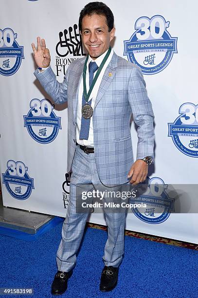 Jockey Victor Espinoza attends the 30th Annual Great Sports Legends Dinner to benefit The Buoniconti Fund to Cure Paralysis at The Waldorf Astoria on...