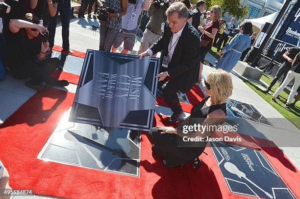 Recording artist Miranda Lambert unveils her star on the Music City Walk of Fame during the Miranda Lambert, Steve Cropper, E.W. "Bud" Wendell &...