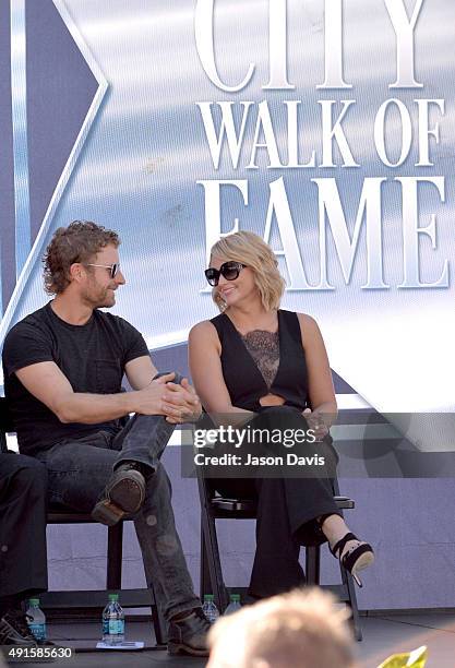 Recording artists Dierks Bentley and Miranda Lambert attend the Miranda Lambert, Steve Cropper, E.W. "Bud" Wendell & Johnny Cash Music City Walk of...