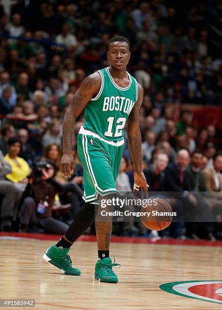 Terry Rozier of the Boston Celtics dribbles against Emporio Armani Milano as part of the 2015 Global Games on October 6, 2015 at the Mediolanum...