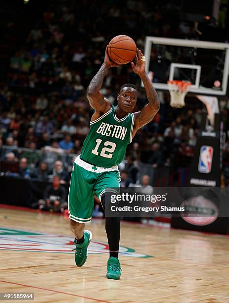 Terry Rozier of the Boston Celtics passes against Emporio Armani Milano as part of the 2015 Global Games on October 6, 2015 at the Mediolanum Forum,...