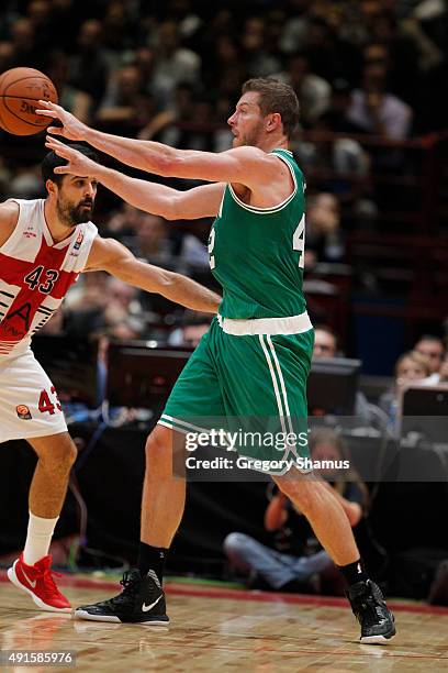 David Lee of the Boston Celtics throws a pass against Emporio Armani Milano as part of the 2015 Global Games on October 6, 2015 at the Mediolanum...