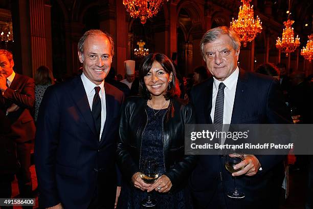 Conde Nast France Xavier Romatet, Anne Hidalgo and Sidney Toledano attend the 'Chambre Syndicale De La Couture' Cocktail Party as part of the Paris...