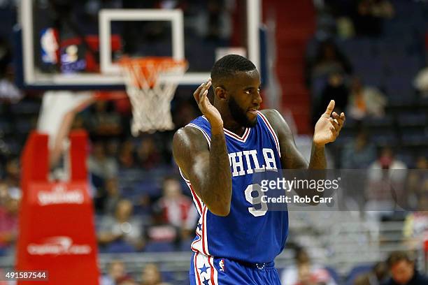 JaKarr Sampson of the Philadelphia 76ers claps during a timeout in the first half against the Washington Wizards at Verizon Center on October 6, 2015...
