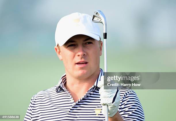 Jordan Spieth of the United States team waits on the practice ground during a practice round prior to the start of The Presidents Cup at the Jack...