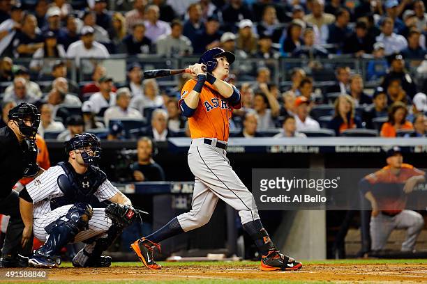 Colby Rasmus of the Houston Astros hits a solo home run against Masahiro Tanaka of the New York Yankees during the second inning in the American...