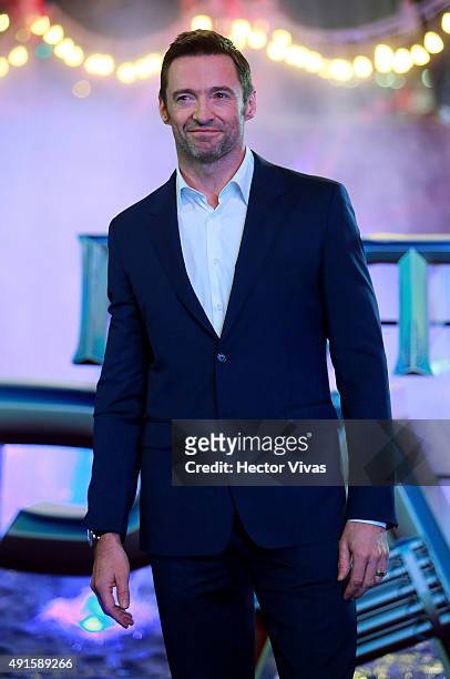 Hugh Jackman poses for pictures during a red carpet to present the movie 'Peter Pan' at Toreo Parque Central on October 06, 2015 in Mexico City,...