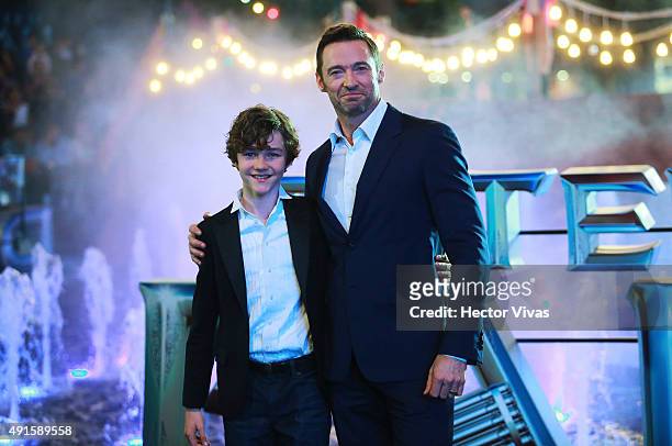 Hugh Jackman and Levi Miller pose for pictures during a red carpet to present the movie ' Peter Pan' at Toreo Parque Central on October 06, 2015 in...
