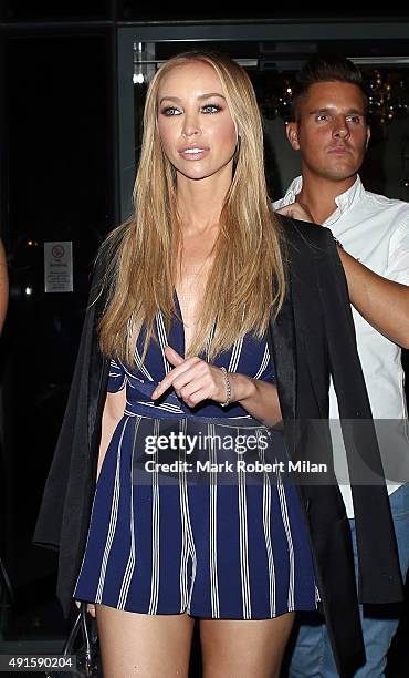 Lauren Pope attending the Mark Hill launch party at the W hotel on October 6, 2015 in London, England.