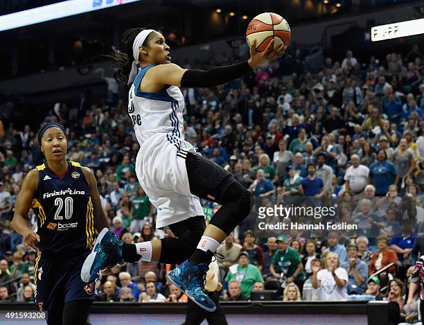 Maya Moore of the Minnesota Lynx shoots against Briann January of the Indiana Fever during the second quarter in Game Two of the 2015 WNBA Finals on...