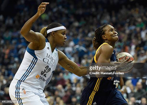 Rebekkah Brunson of the Minnesota Lynx fouls Tamika Catchings of the Indiana Fever during the third quarter in Game Two of the 2015 WNBA Finals on...