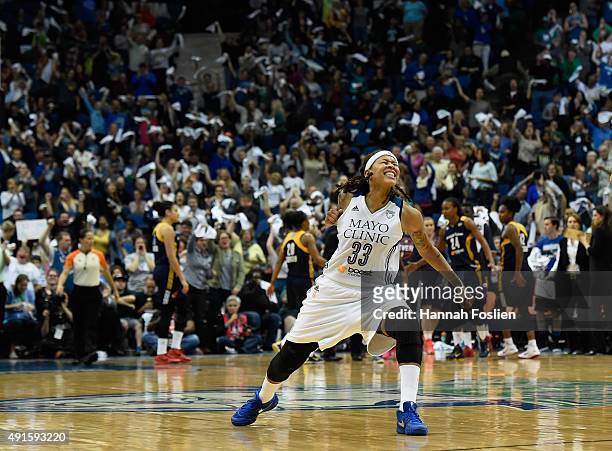 Seimone Augustus of the Minnesota Lynx celebrates scoring the go ahead basket against the Indiana Fever during the third quarter in Game Two of the...